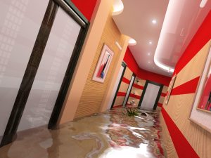 A flooded office hallway in need of water damage restoration in Austin, Texas